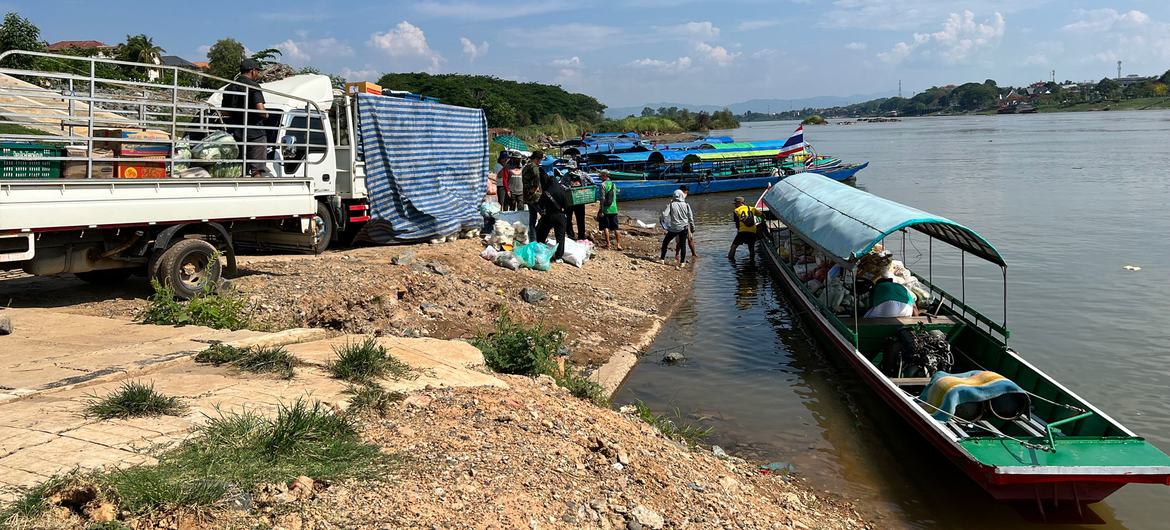 Goods being loaded onto a boat in Lao People's Democratic Republic to be transported across the Mekong river to Thailand. (file) Goods being loaded onto a boat in Lao People's Democratic Republic to be transported across the Mekong river to Thailand. (file)
