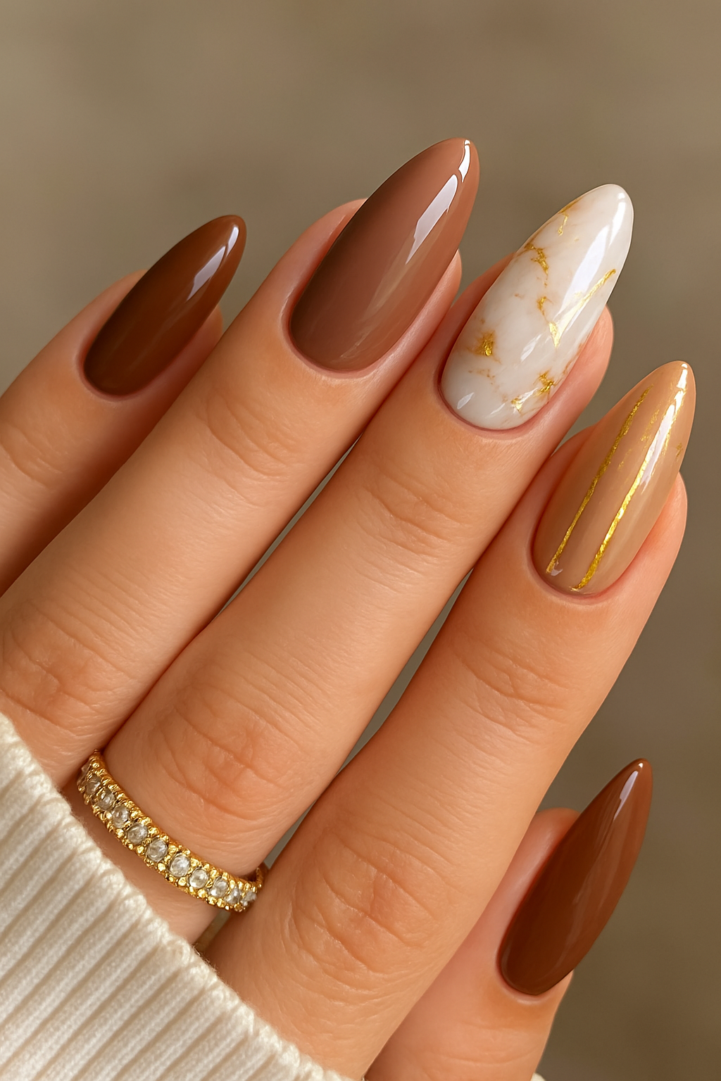 Chic Almond Nails with Mocha, Nude & Gold Marble Accents | Autumn Luxury Nail Art Inspiration