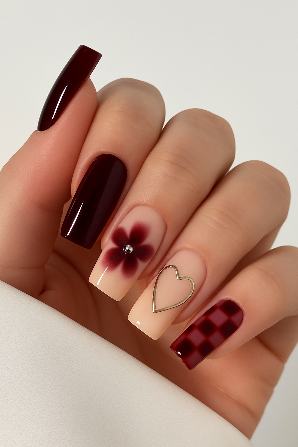 Romance Meets Edge: The Burgundy Nail Art Revolution