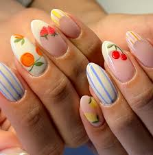 Nail Art That Speaks Style: From Cherry Blossoms to Accessory Glam