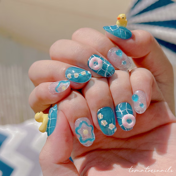 Nail Art That Pops: From Marble Elegance to Ducky Delight