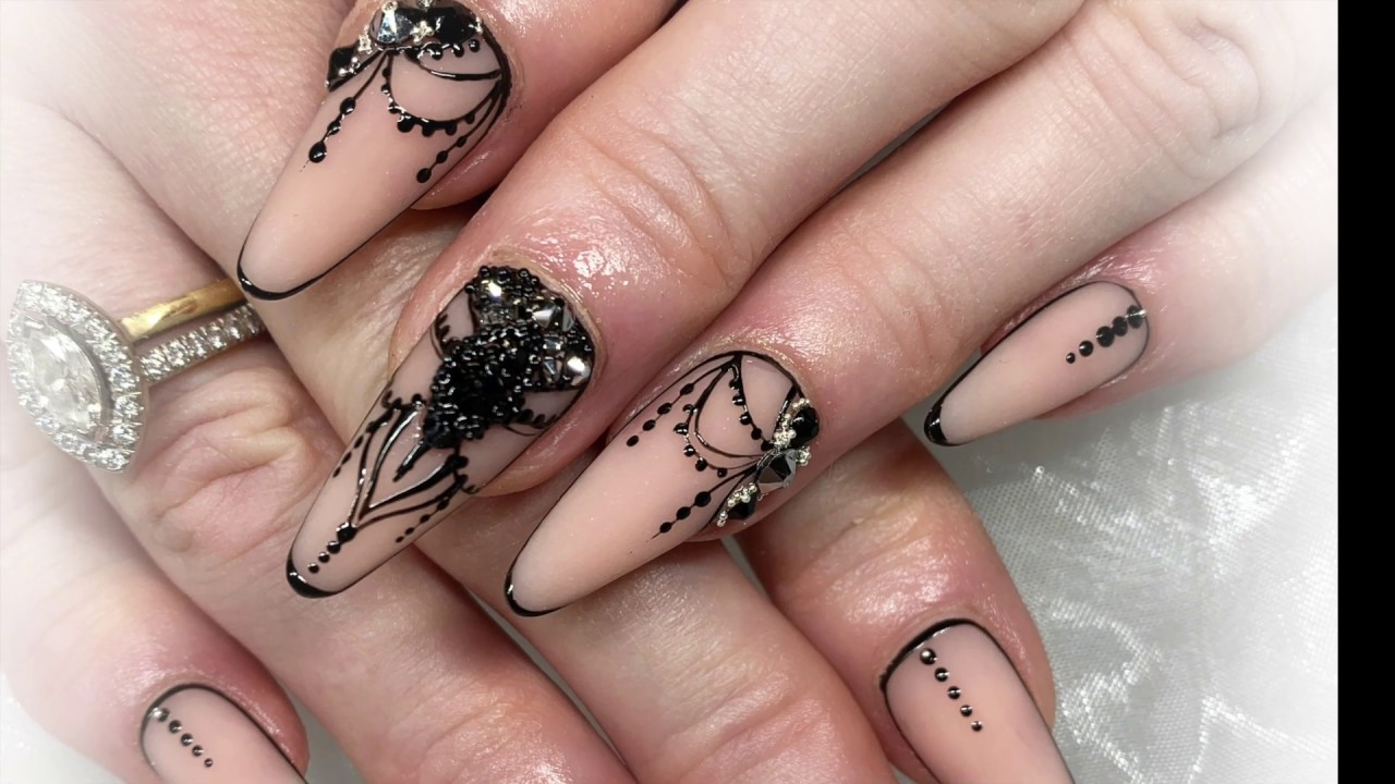 Nail Art That Speaks Your Style: Fall, Fun & Gothic Designs to Try Now